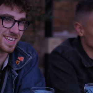 Two lads having a pint at the pub