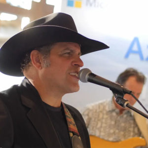 Man singing at Symphony AI event